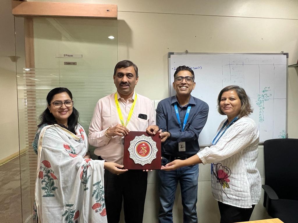 Samarthanam Silver Jubilee memento to the Atos Syntel team