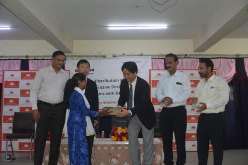 Mr. Kengo Ogawa from Komatsu India Private Limited distributed assistive devices to people with disabilities-6