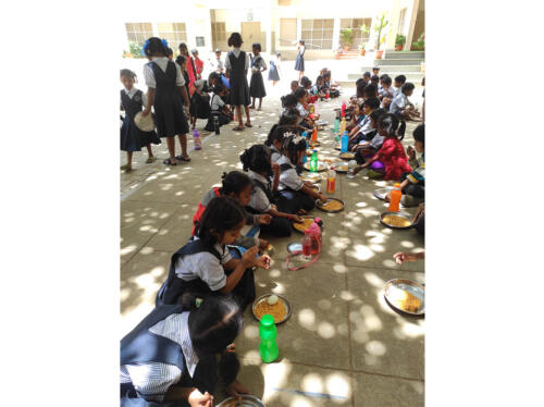 Vidyaprasad, the midday meal initiative of Samarthanam, serves nutritious food along with eggs and bananas to kids-2